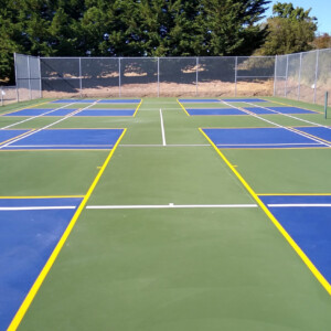 end-view of multiple courts without nets